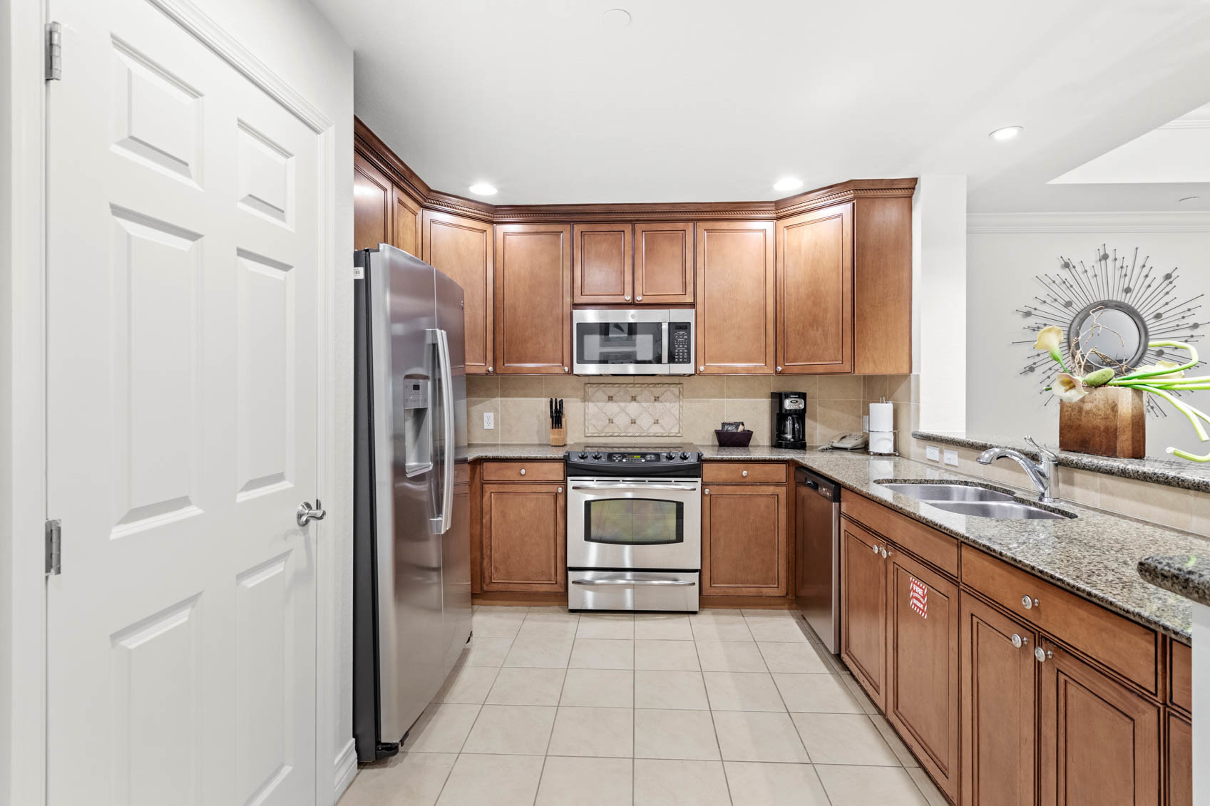 kitchen with brown cabinets and breakfast counter